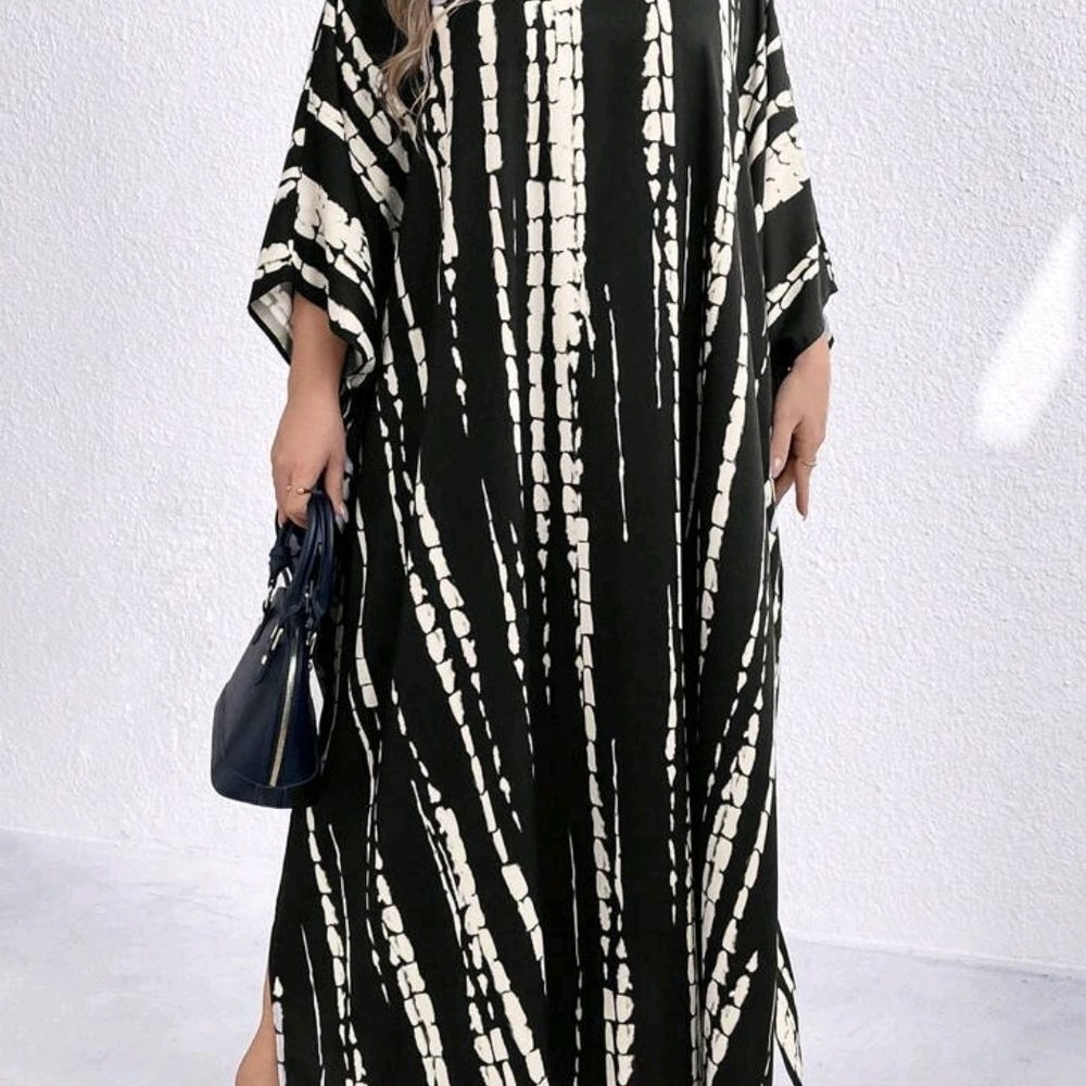 Elegant Black and White Women's Dress Perfect For Moomoo Party